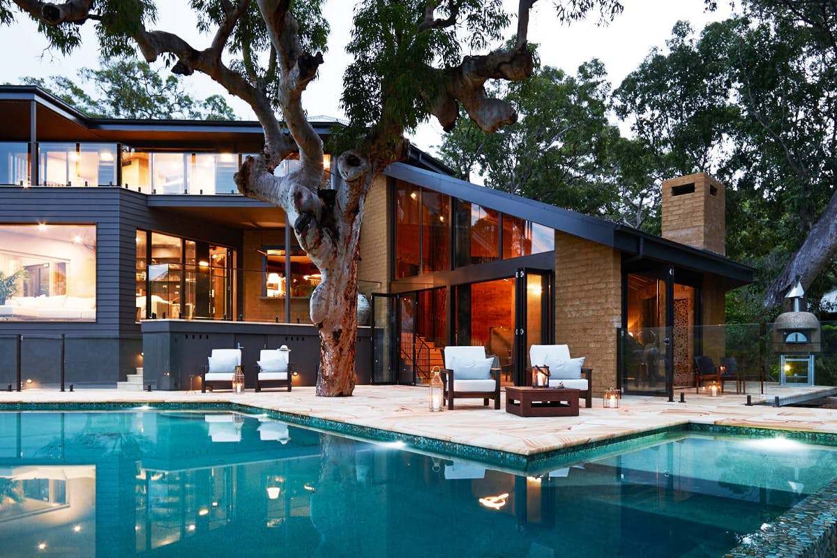 An infinity pool beside an architecturally designed home in Pretty Beach.
